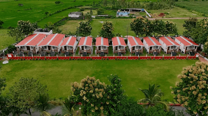 Aerial view of cottages and lawn